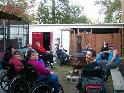 Barbara, Maria, Meg, Angie, Stacey, Mandy, Mathew, Brantley, Big Daddy, and Bryan around fire 11-20-10