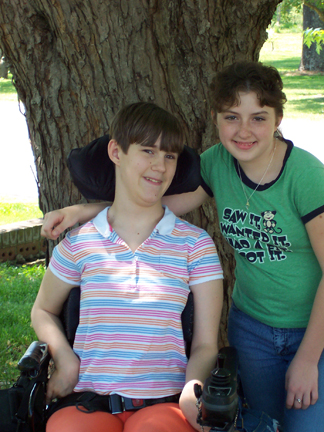 Brantley and Cousin Ashley in Front of Tree - 5-08-200502