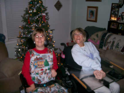 Brantley and Stacey with matching hair under the Christmas tree 12-3-10