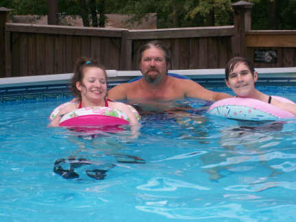 Mandy, Roy, and Brantley in the pool at Connie's 8-22-10