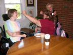 Maria feeding Brantley, and Rose-Mary feeding Maria 3-20-11 Thumbnail.jpg