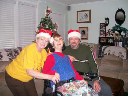 Mommy, Brantley, and Big Daddy under the Christmas Tree 12-11-10